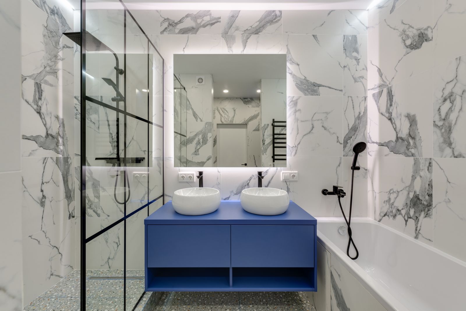 Luxury renovated bathroom with glass walk-in shower