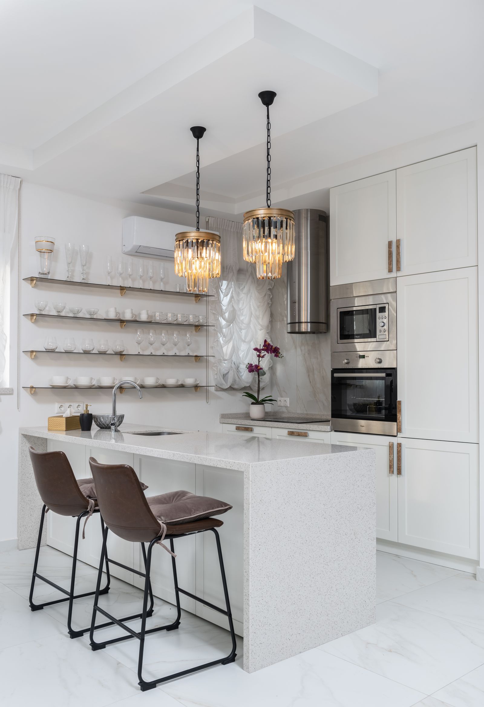 Renovated modern kitchen with island and pendant lighting